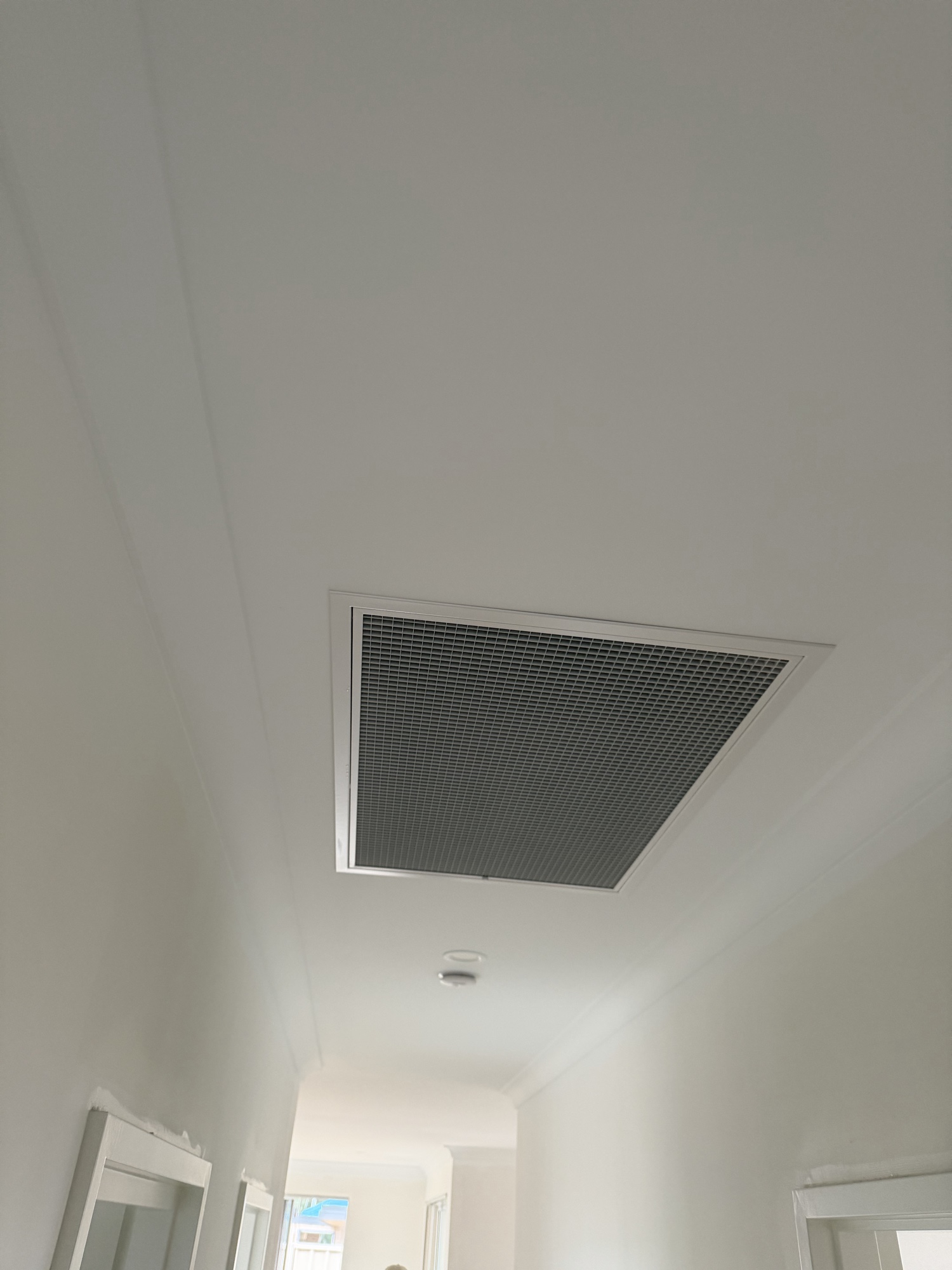 Clean ceiling return air grille after ducted install