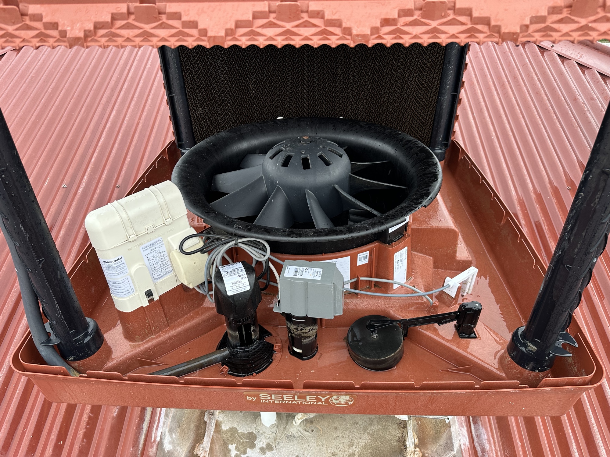 Evaporative cooler after service — clean pads, pump and motor