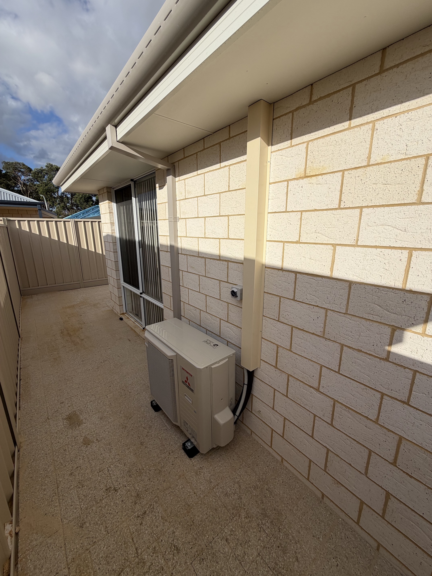Neat split system installation with pipe cover